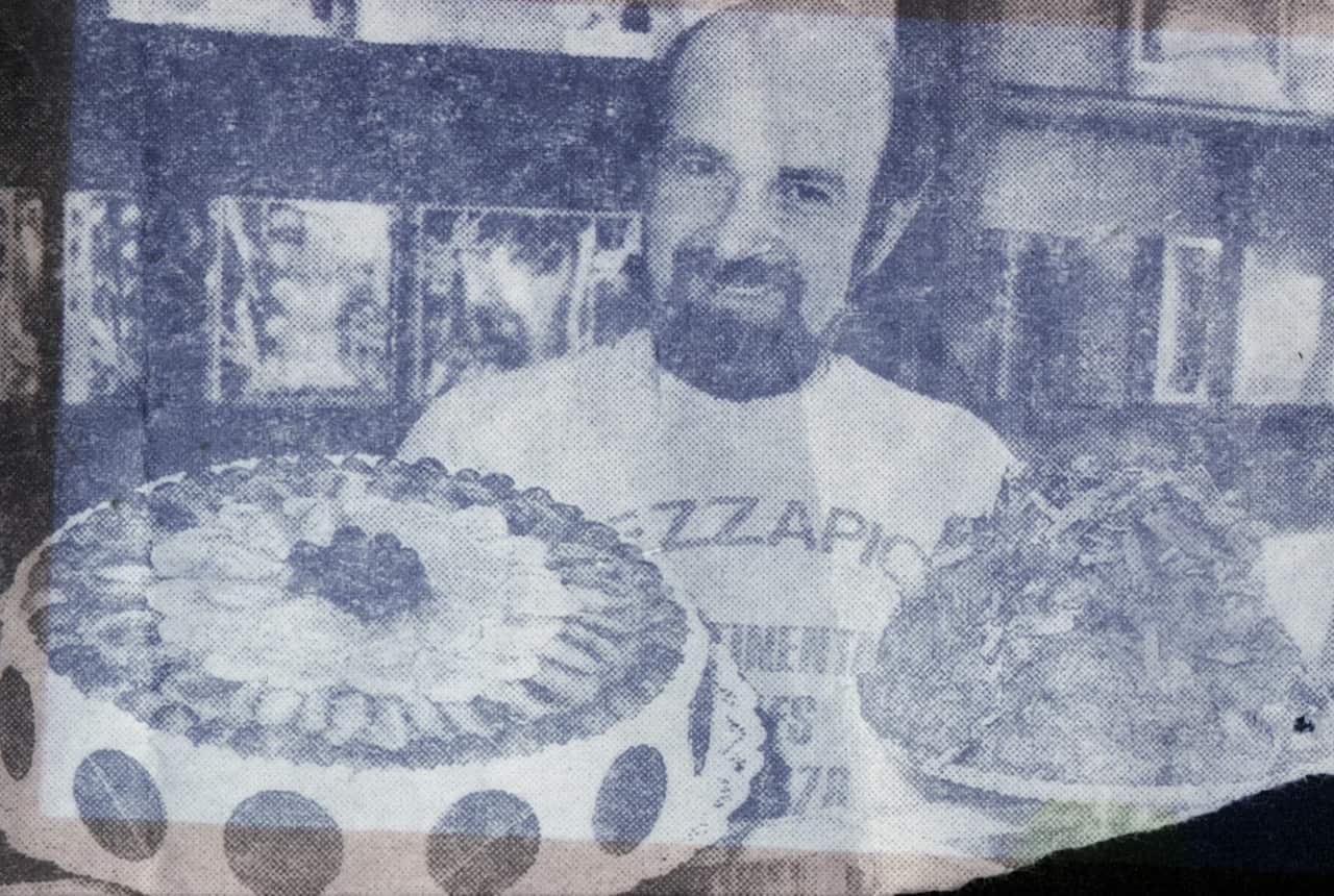 A younger Frank Portelli with his cakes