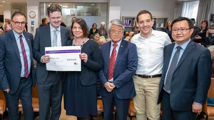 Faye Spiteri (Tsolaki) accepting a $250k grant from the Victorian State Government to Fronditha Care at its nursing home in Clayton South