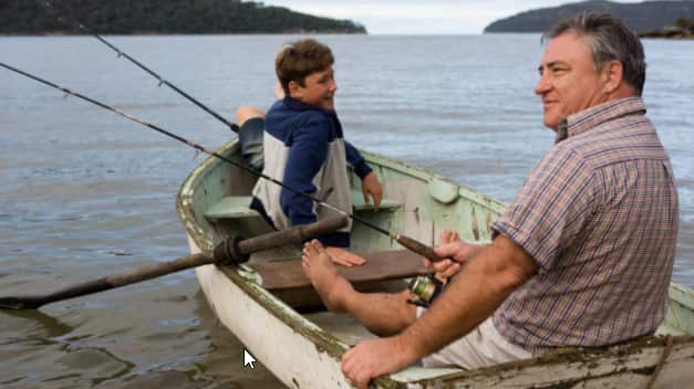 Adult and child fishing