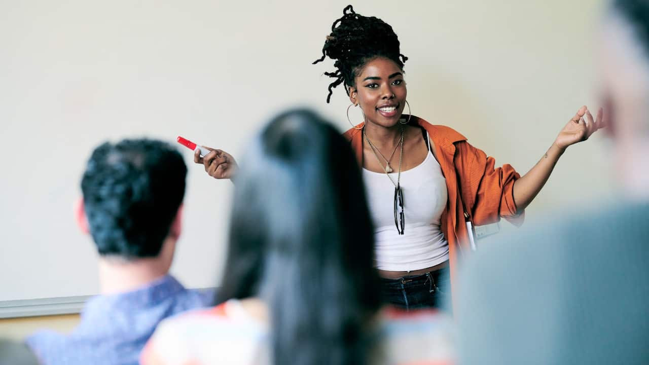 female lecturer, adult learning for migrants