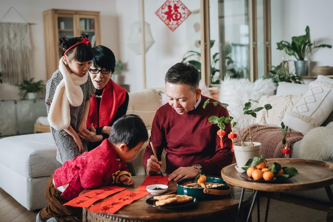 Asian family red envelopes