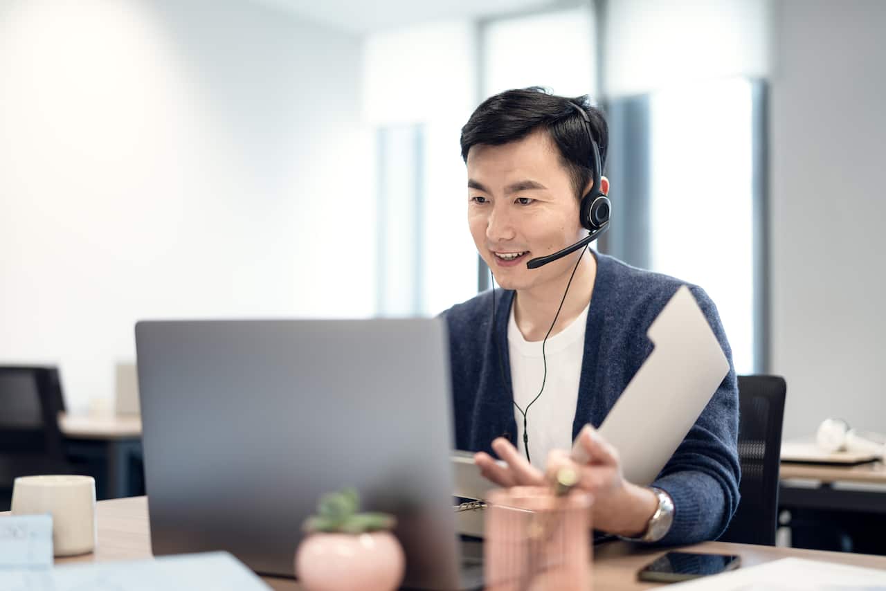 Business people negotiate business through video conference