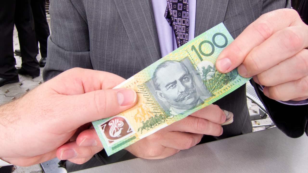 Australian money exchanges hands