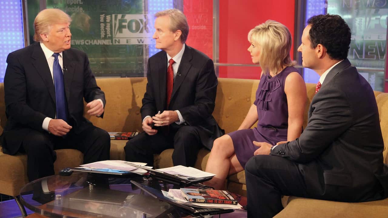 NEW YORK, NY - DECEMBER 06: (L-R) Donald Trump talks with 'FOX & Friends' hosts Steve Doocy, Gretchen Carlson and Brian Kilmeade at FOX Studios on December 6, 2011 in New York City. 