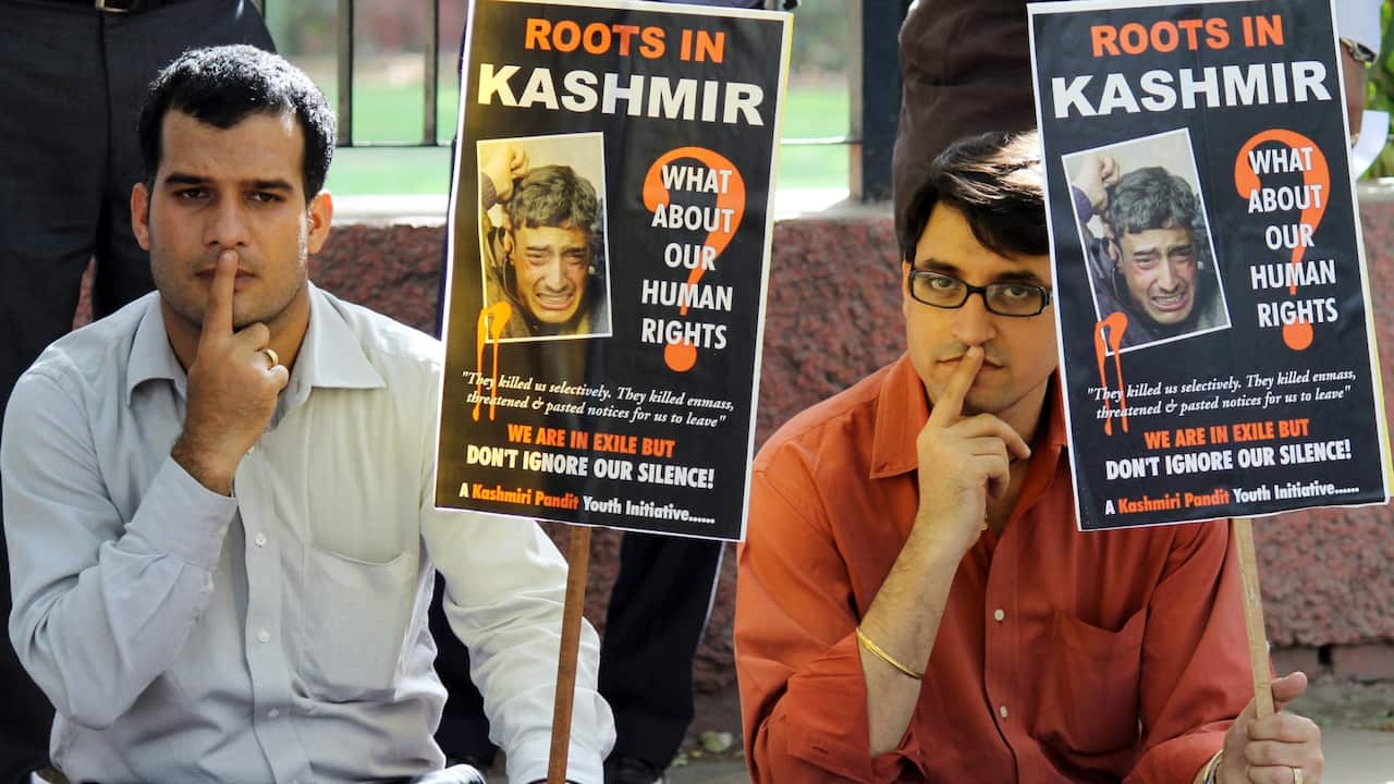 Protestors belonging to the Kashmiri Pandit group 'Roots in Kashmir' participate in a silent protest on 'World Refugee Day' in New Delhi. (file)