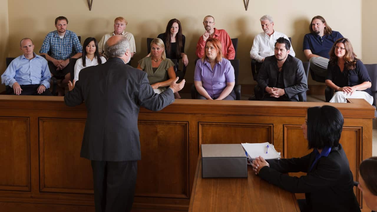 Lawyer and jury Getty Images/RichLegg