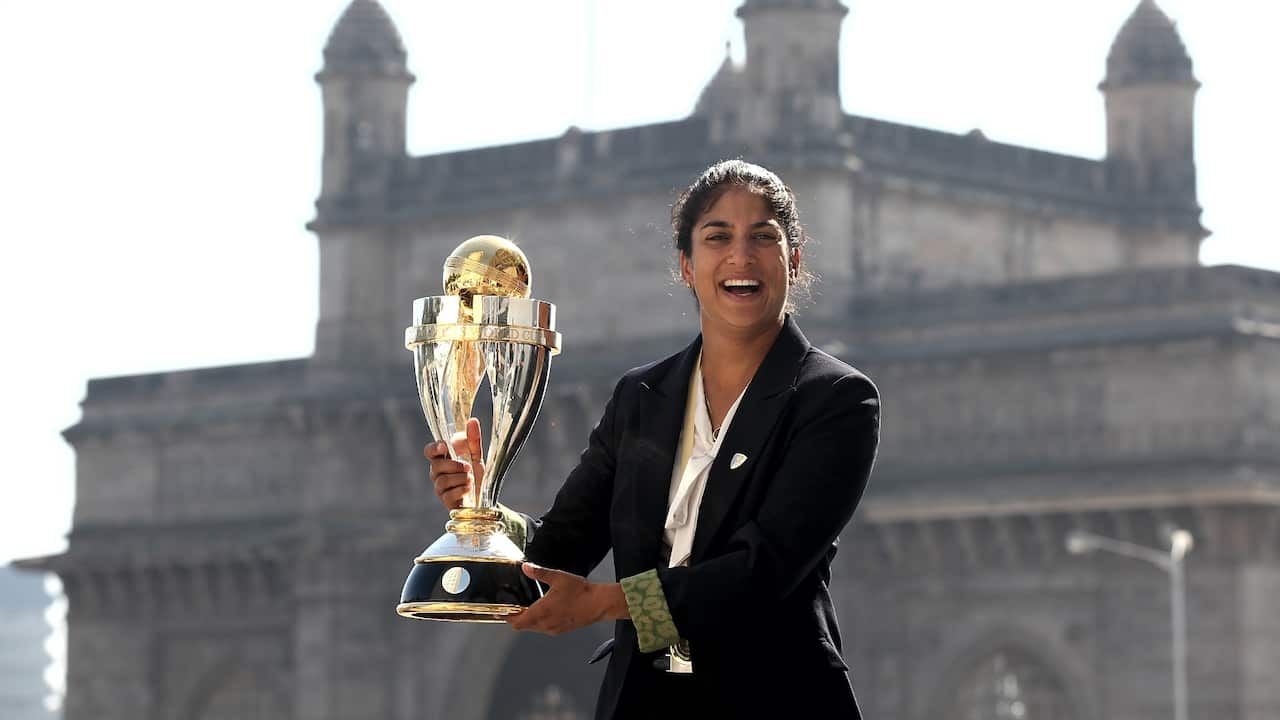 Lisa Sthalekar of Australia poses with the trophy on February 18, 2013 in Mumbai, India. Australia won against the West Indies of the ICC Women's World Cup.
