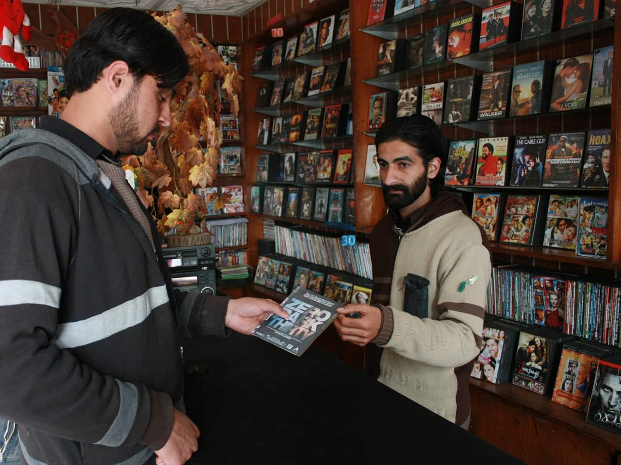 Pakistani shopkeeper with Oscar-nominated Zero Dark Thirty 