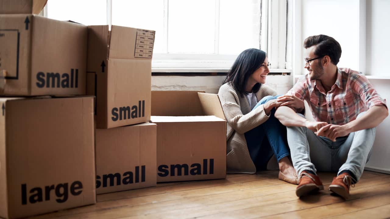 A couple moving into a new house