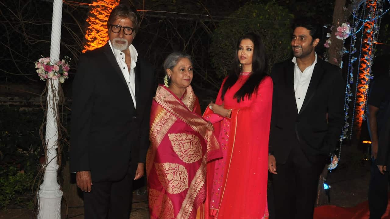 Bollywood actor Amitabh Bachchan and wife Jaya Bachchan arrive with their son Abhishek and daughter-in-law Aishwarya Rai