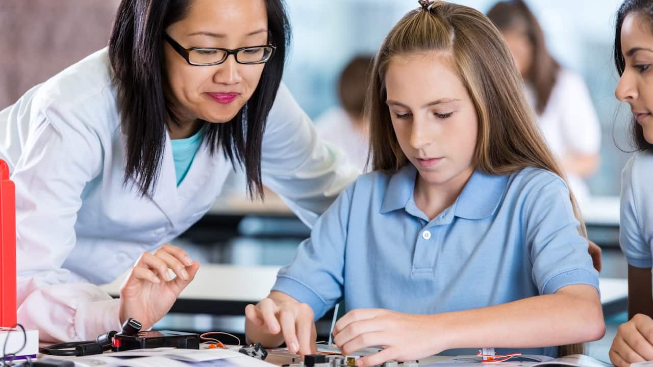 teacher with student