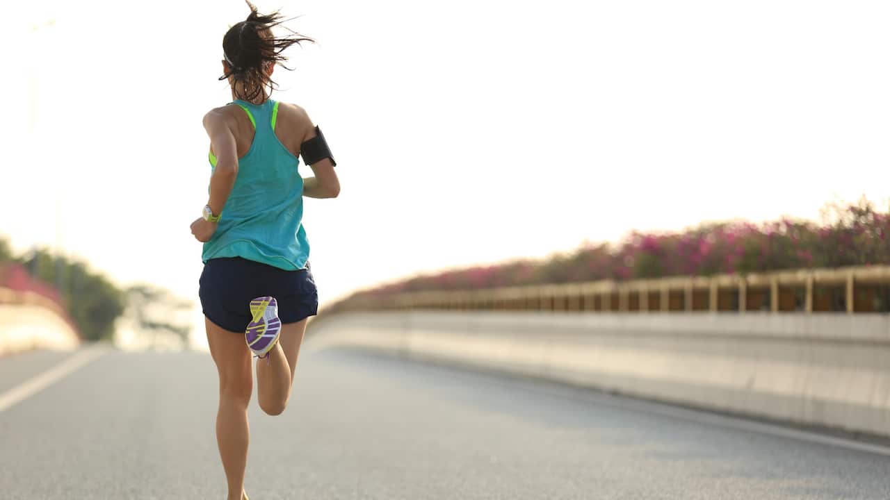 Woman running Getty Images/lzf