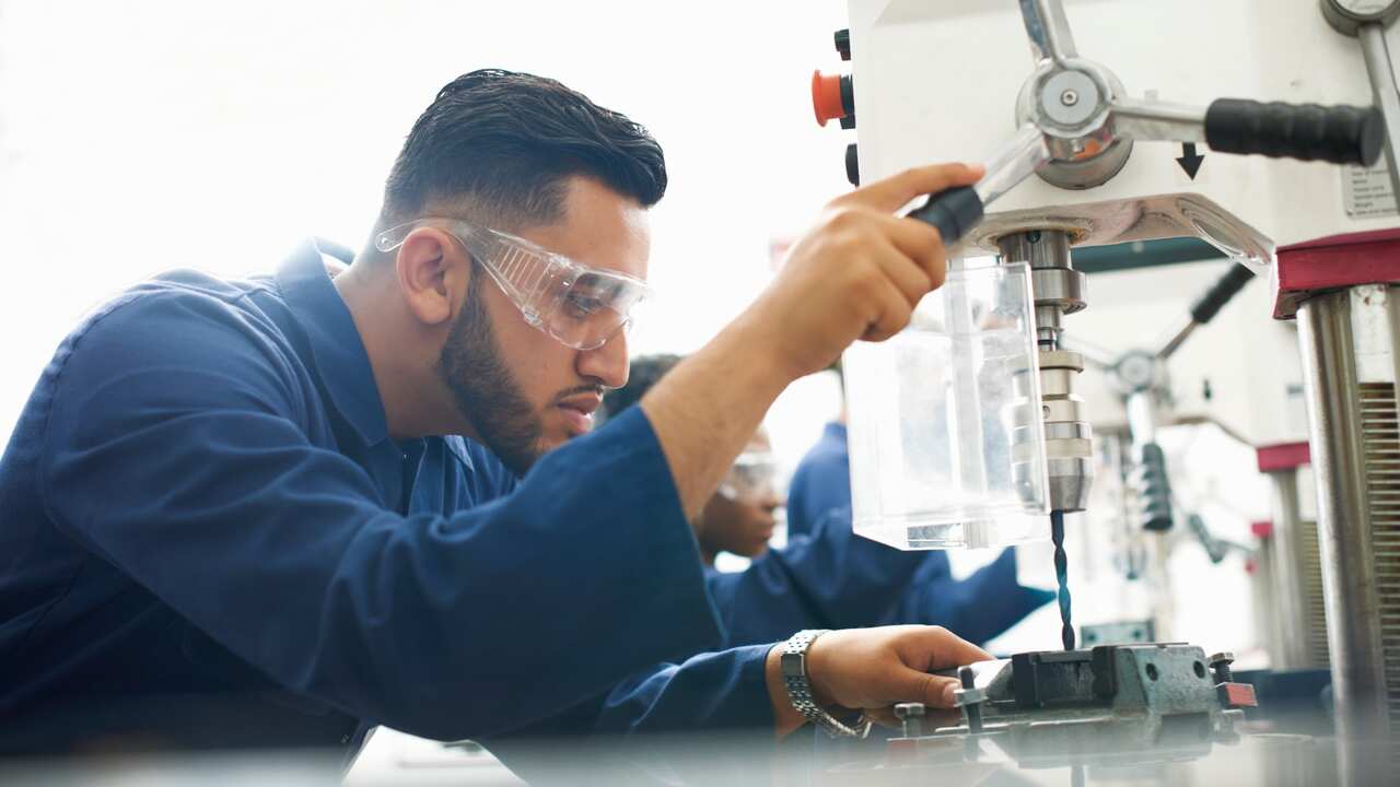 Man at a drilling machine, TAFE