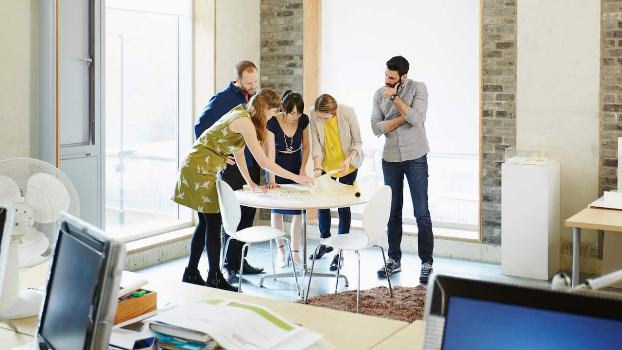 Young people in a modern office.