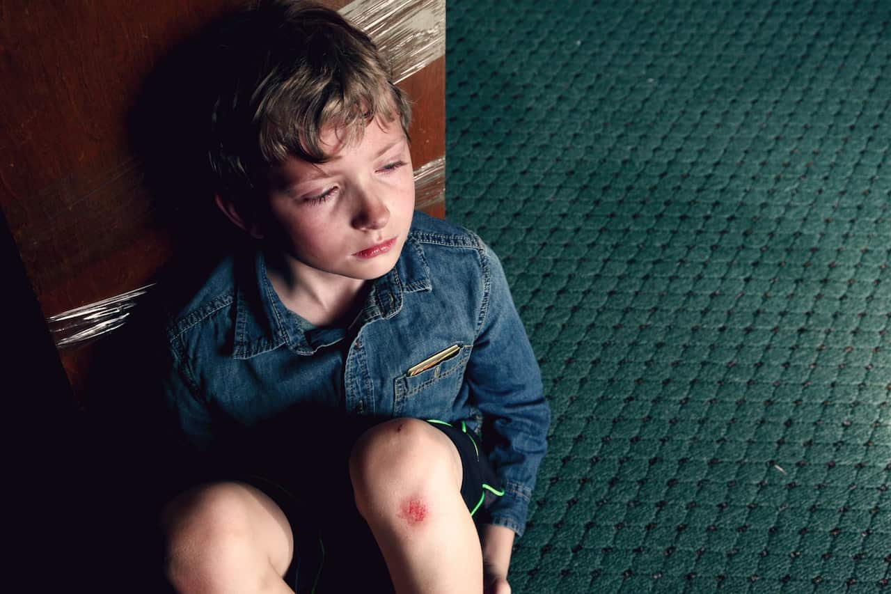 High Angle View Of Crying Boy