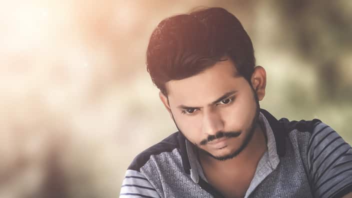 Young man looking worried