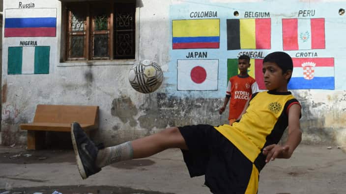 Kid playing football