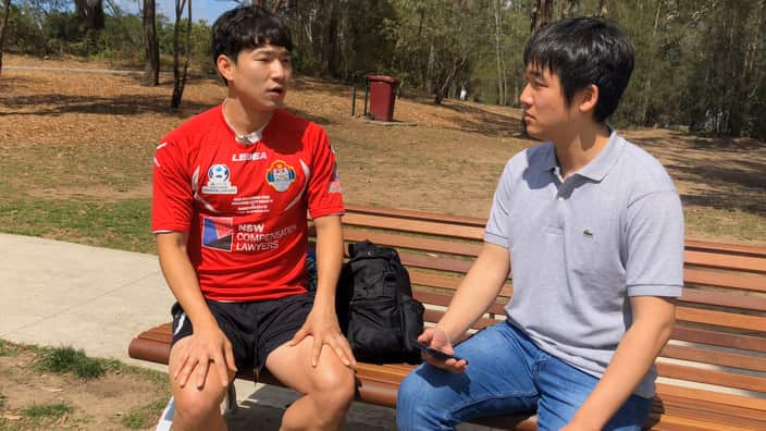 Bonnyrigg White Eagles’midfielder Gil Mun-Soo and SBS Korean program’s Jun Lee 