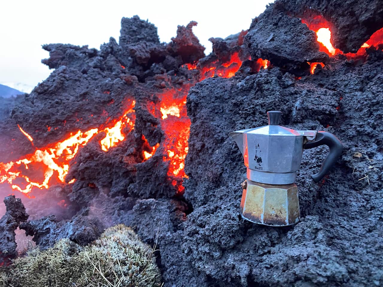 An Italian coffee machine on volcanic rocks