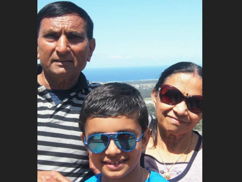 Gokuldas with his wife and grandson.