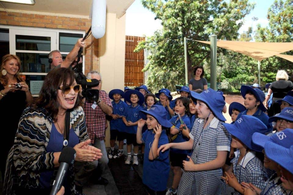 Haris Alexiou with Alphington Grammar students in Melbourne.