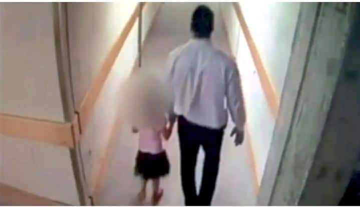 CCTV captured Al Bayati while holding the child's hand down the stairs in the chopping centre