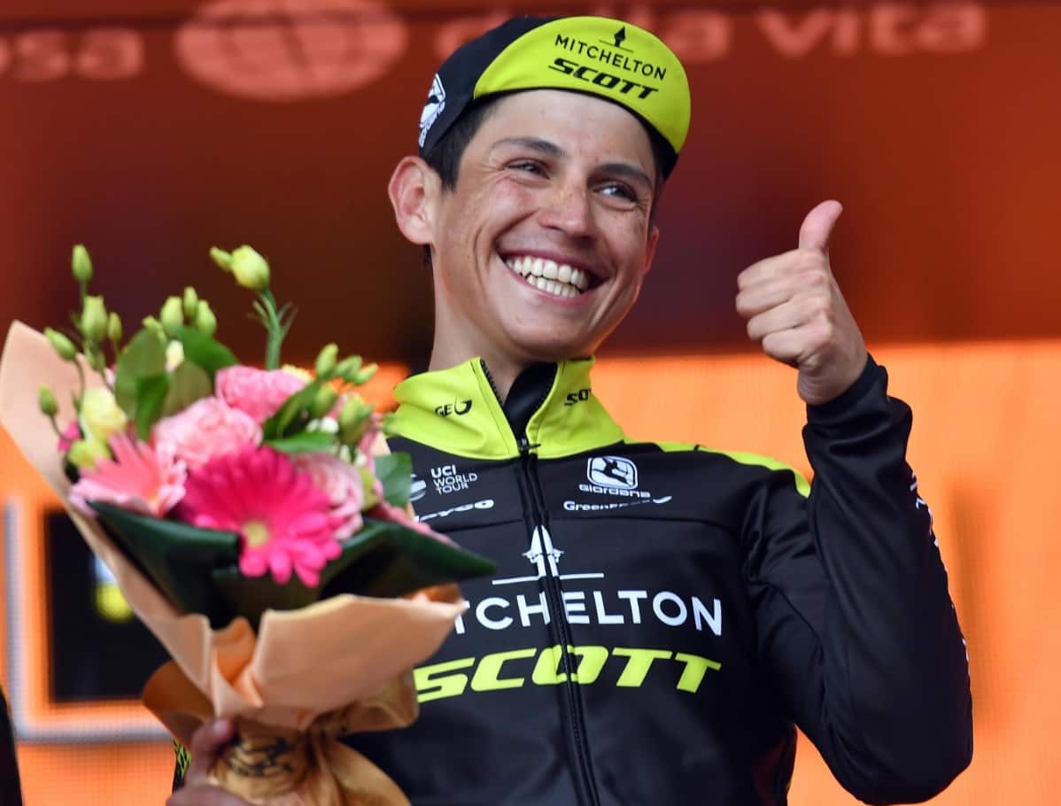 Colombian rider Esteban Chaves of Mitchelton-Scott celebrates on the podium after winning the sixth stage of the Giro d'Italia cycling race