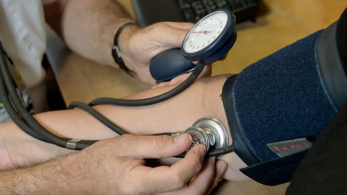 Dr Laurence Buckman checks a patient's blood pressure in his practice room at the Temple Fortune Health Centre GP Practice near Golders Green, London.. Picture date: Wednesday September 10, 2014. Photo credit should read: Anthony Devlin/PA Wire