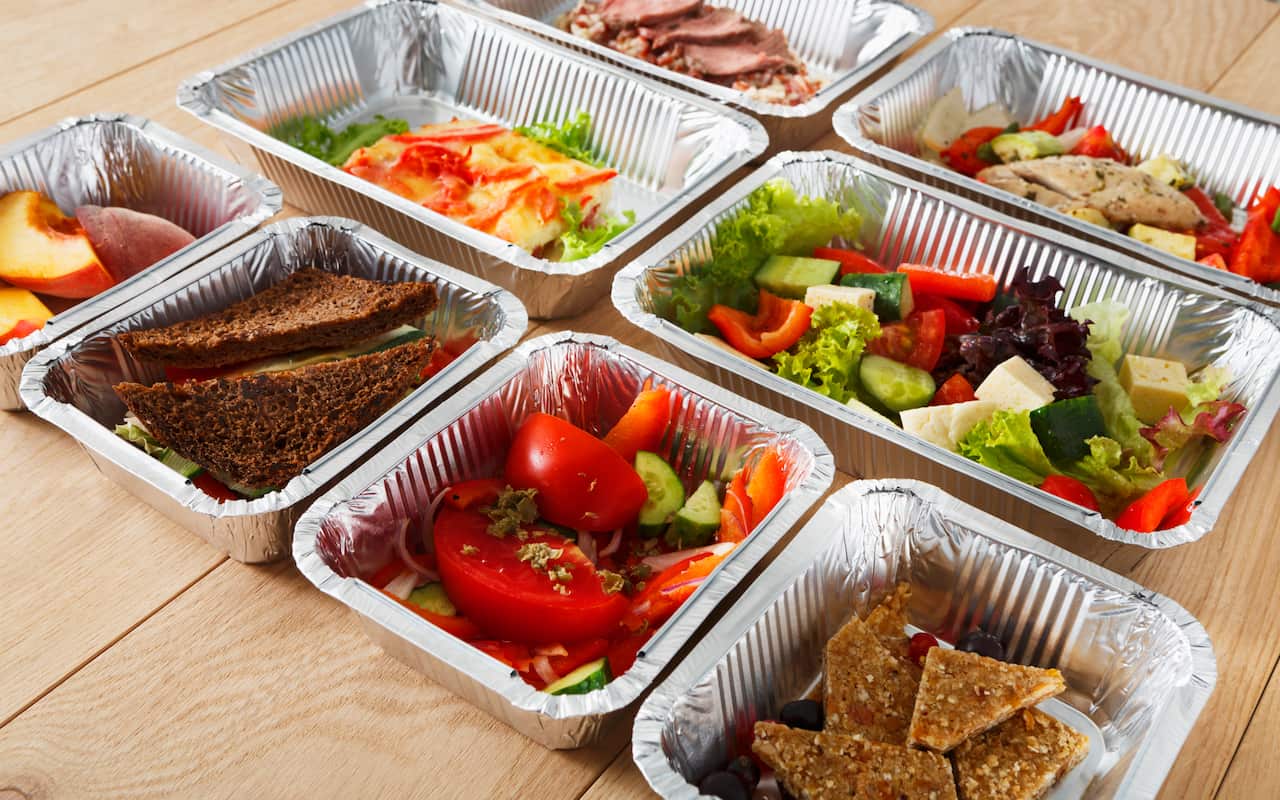 Healthy food in boxes, diet concept.