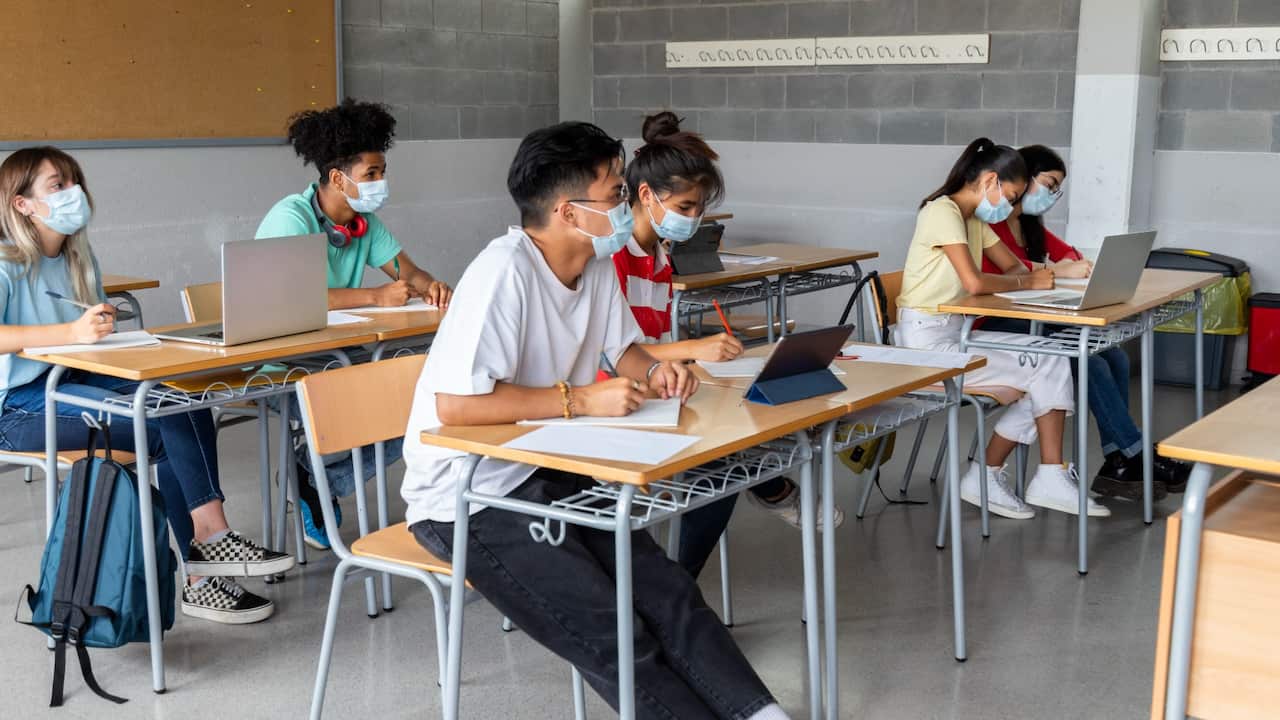 High school students learning inside their classroom