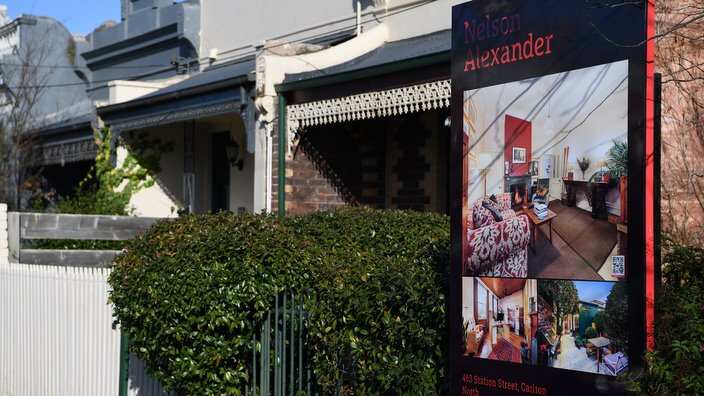 Signage for a real estate property is seen in Carlton North, Melbourne, Wednesday, July 18, 2018. (AAP Image/James Ross) NO ARCHIVING
