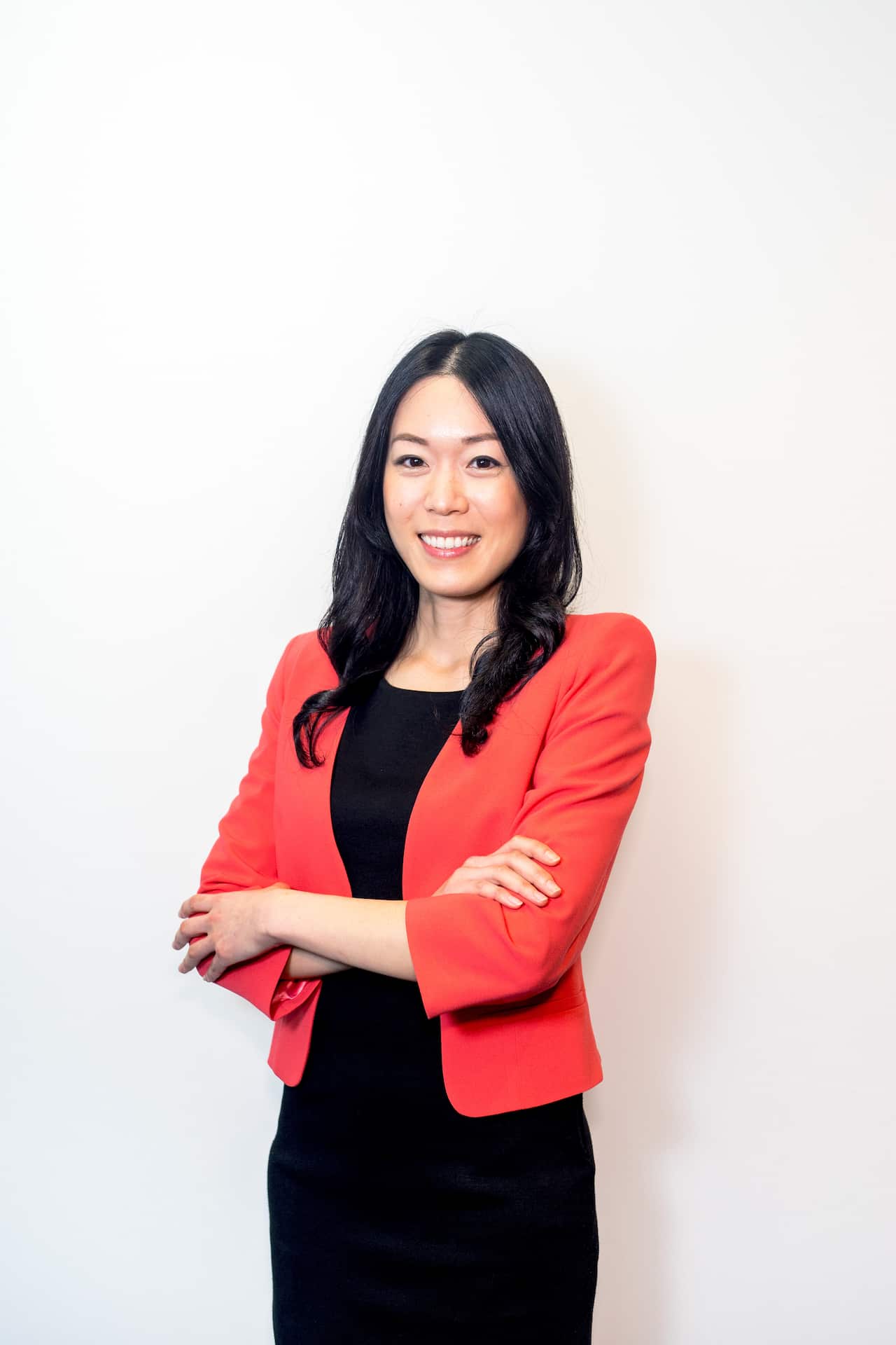 Pacharanun Suwinyatichaiporn, a Thai registered migration agent in the office