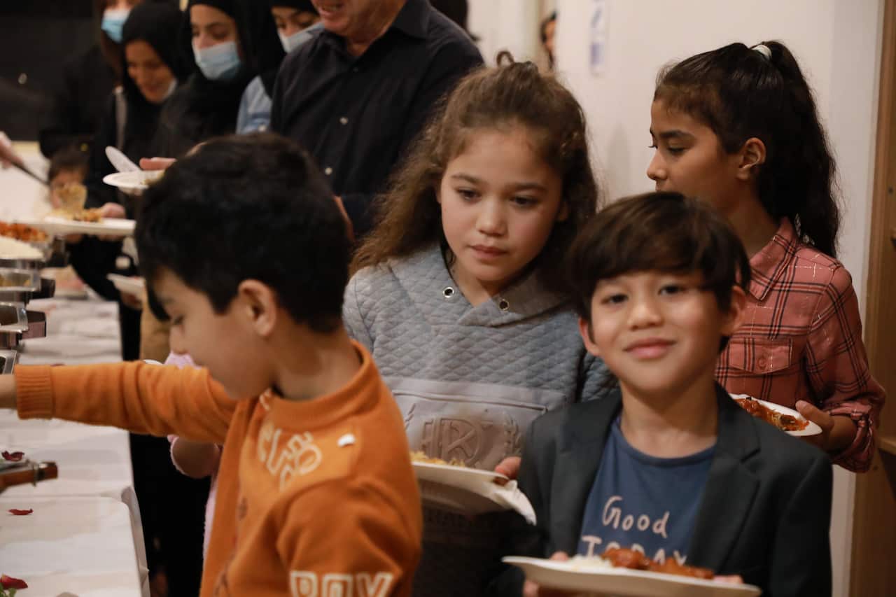 Children enjoying the mass Iftar event in Sydney.