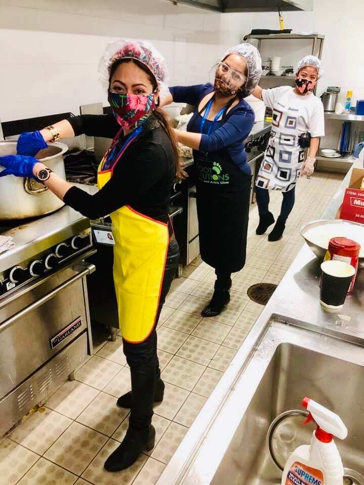 Mental health volunteers cook meals for the community under a 45-day meal initiative.