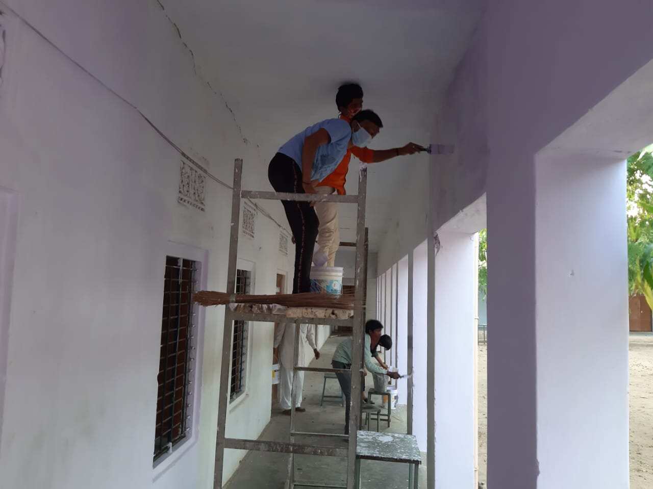 Migrant workers painting the school in Pansana, district Sikar, Rajasthan India