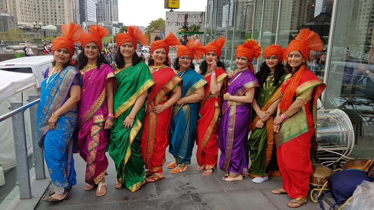 Members of the Jana Garjana Dhol Pathak dressed up in traditional 'Navari' sarees for an event in Melbourne.