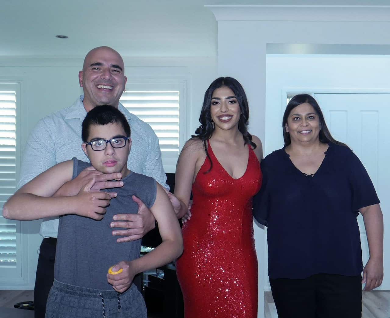 Alicia George with her parents Toufic and Verna and her little brother Anthony.