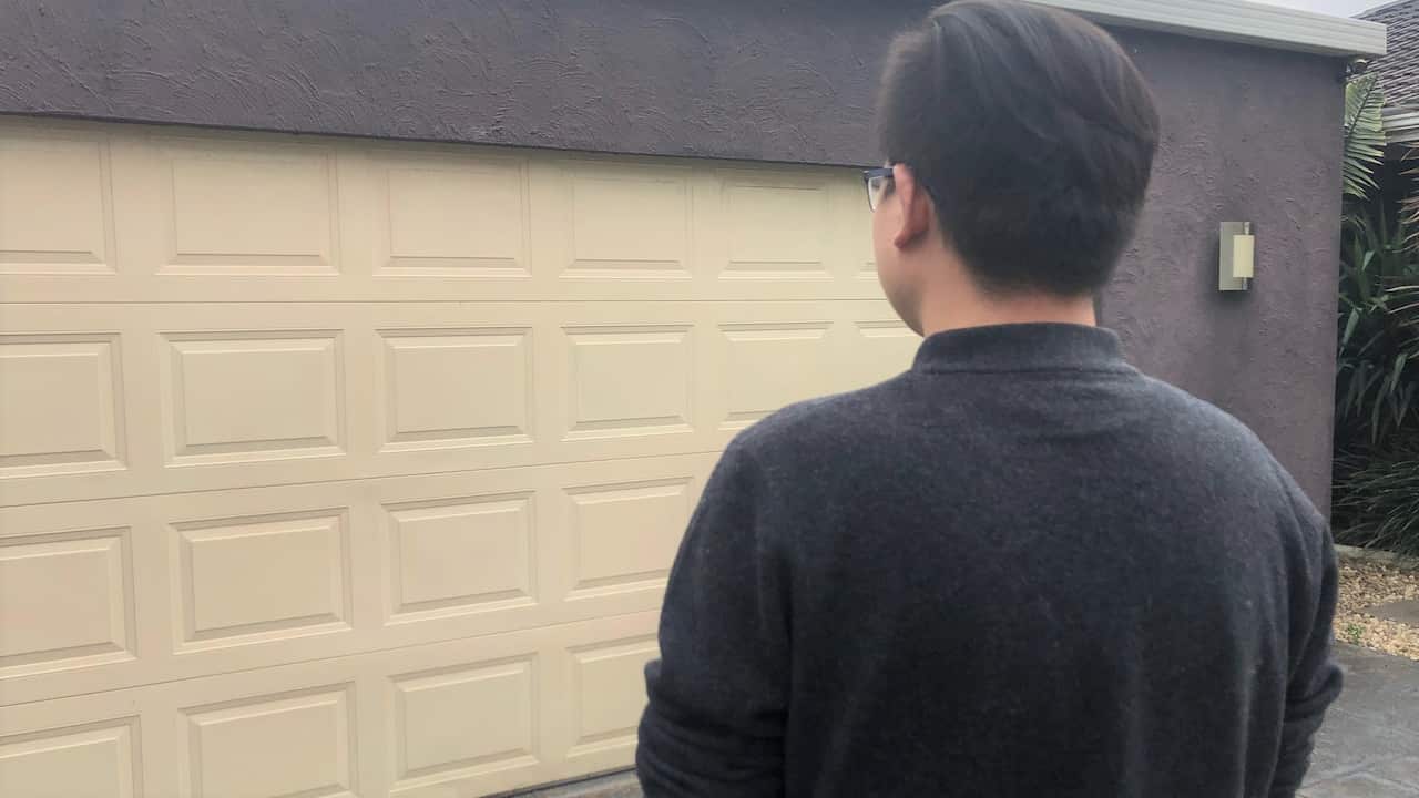Jackson appreciates his neighbours' help in cleaning up the racial slurs on his garage door.