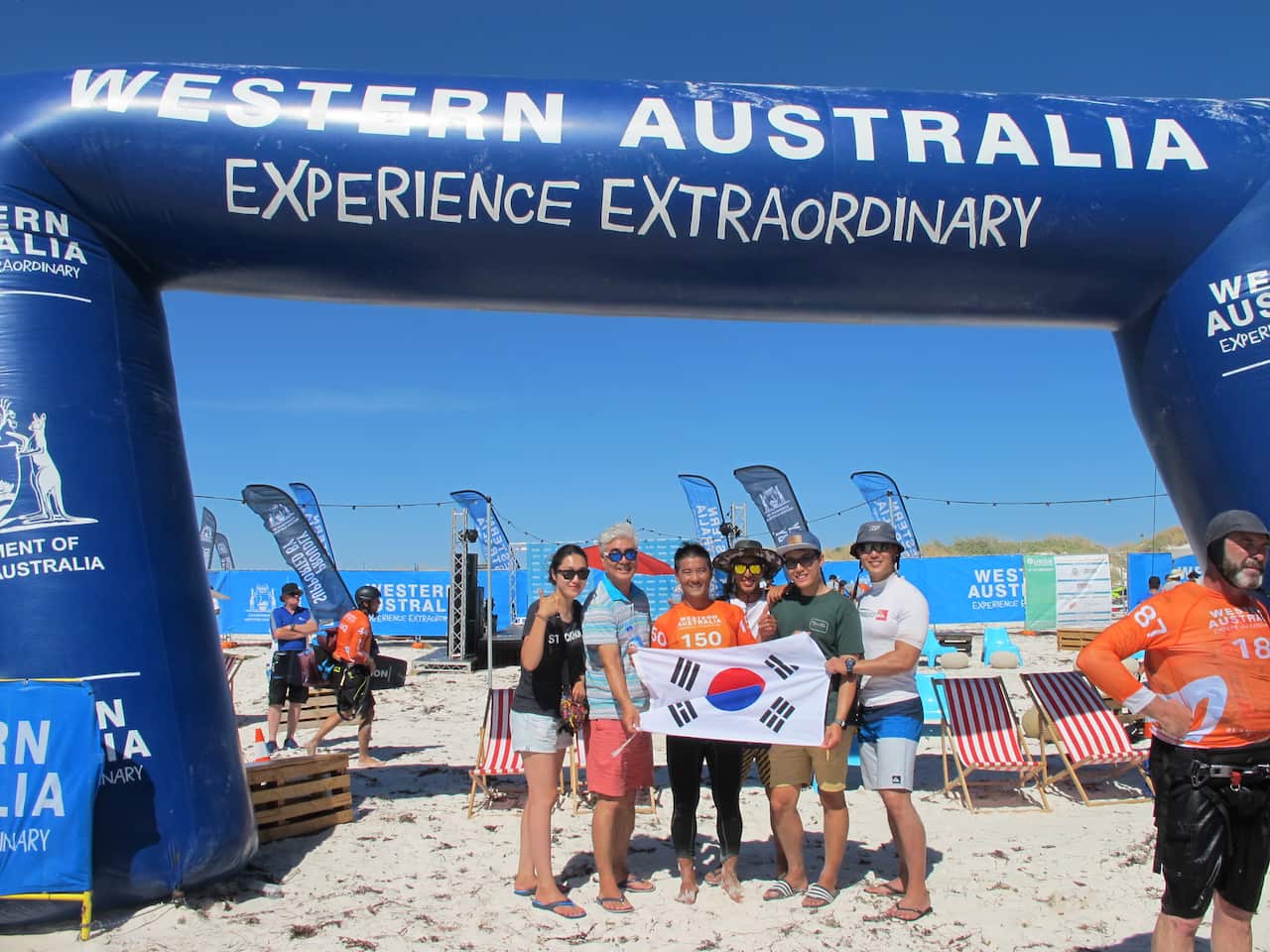 Kwon in the middle with Korean flag