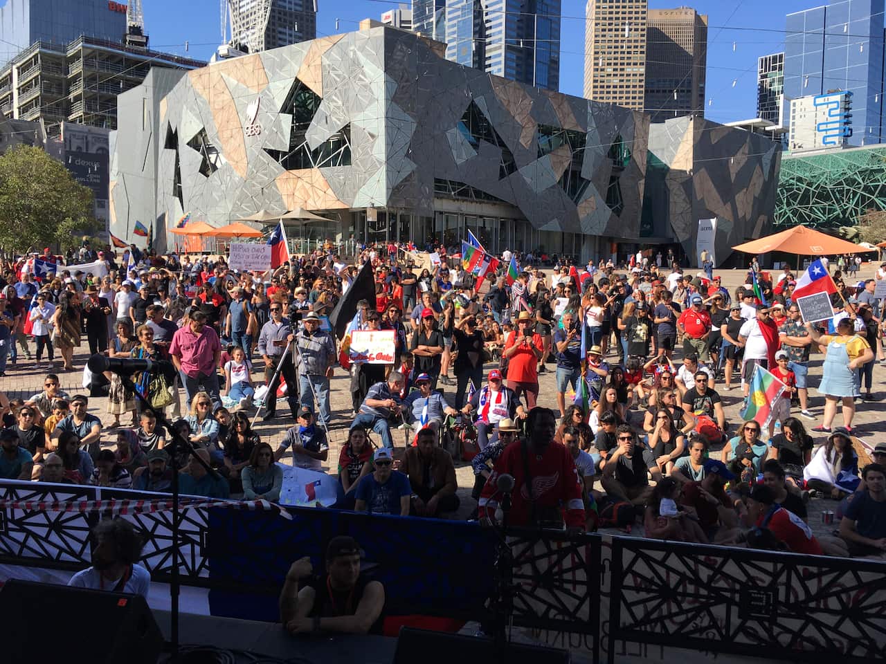 Chileans in a concert for Chile at Federation Square, in Melbourne.