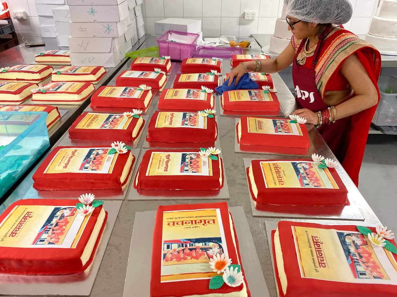 Cakes with icing in different Indian languages for BAPS Annakut 2019