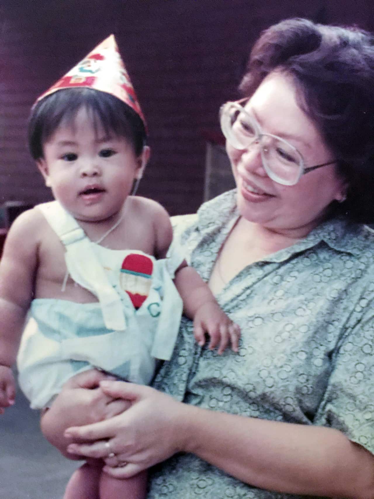 A younger Ross Magnaye and his grandmother, Carol