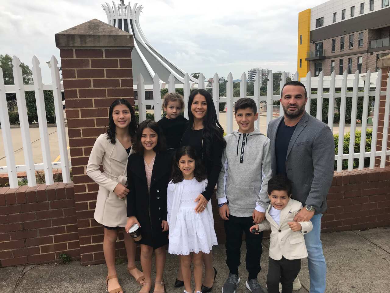 Abdallah's family in front of Our Lady Of Lebanon church in western Sydney