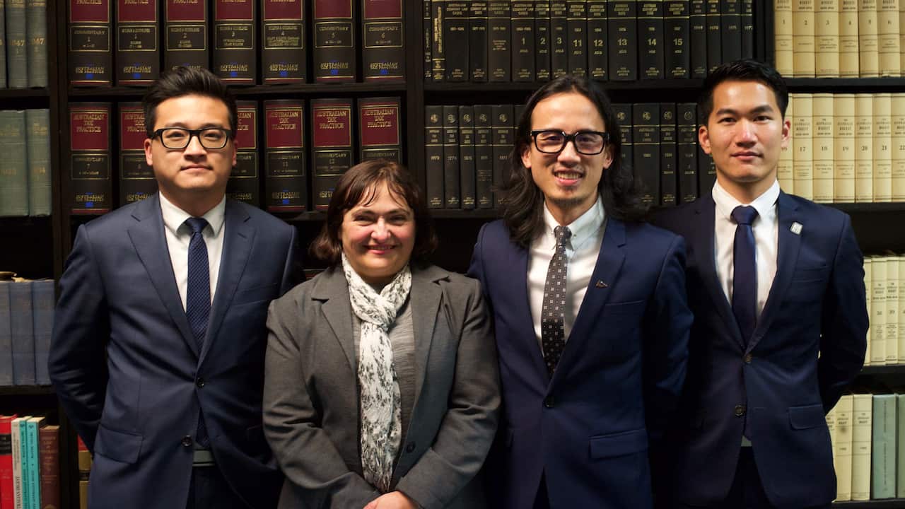 Ta Quang Huy (the second from the right) and Roz Germov (the second from the left)