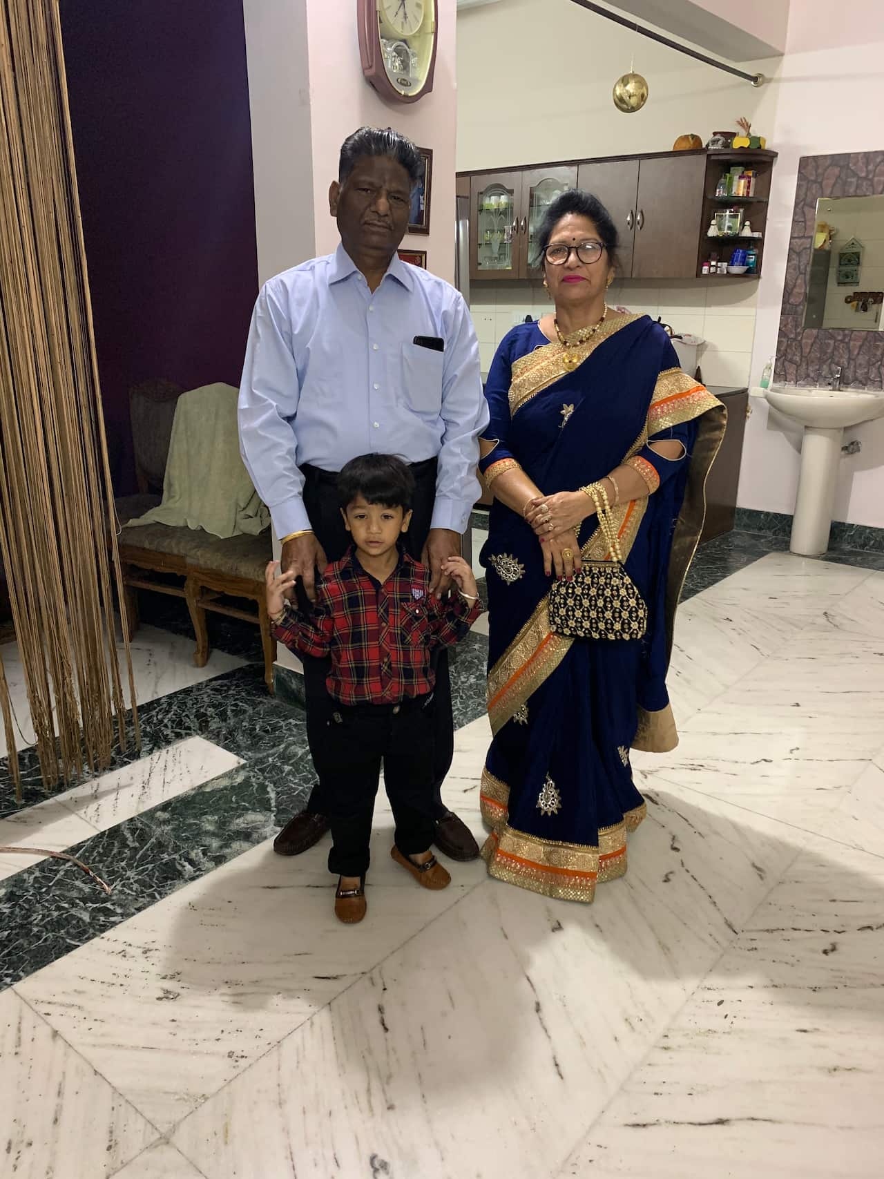 Aarya Mittal with his grandparents in India 