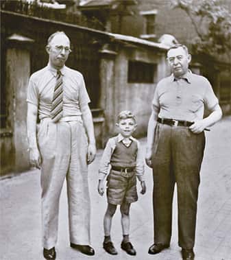 Sam Moshinsky with his father and grandfather outside their family business, The Shanghai Cardboard Box Factory c.1939
