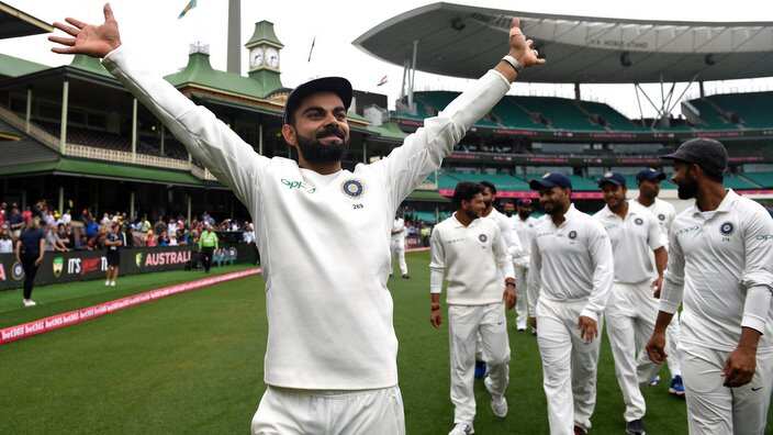 Virat Kohli gestures to supporters as India celebrate a 2-1 series victory over Australia.