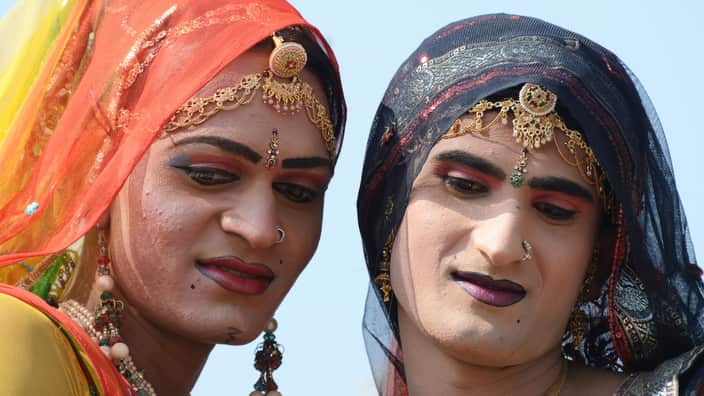 Men - hijras, dressed as women