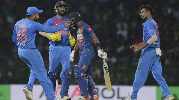 India's team members celebrate the dismissal of Sri Lanka's Dinesh Chandimal during their Twenty20 cricket match in Nidahas Triangular series in Colombo, Sri Lanka, Tuesday, March 6, 2018. (AP Photo/Eranga Jayawardena)