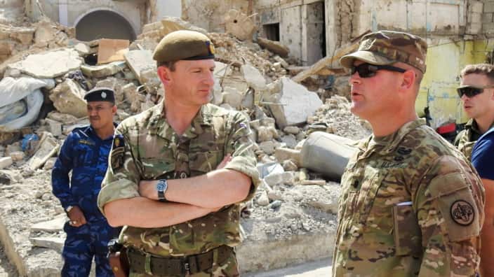 British Maj. Gen. Christopher Ghika seen in the streets of Mosul to observe the destruction caused by ISIS